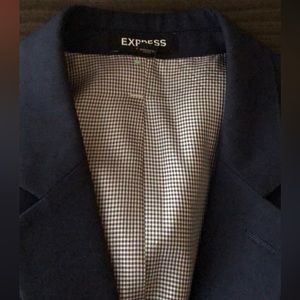 2 used suits in good condition express brand